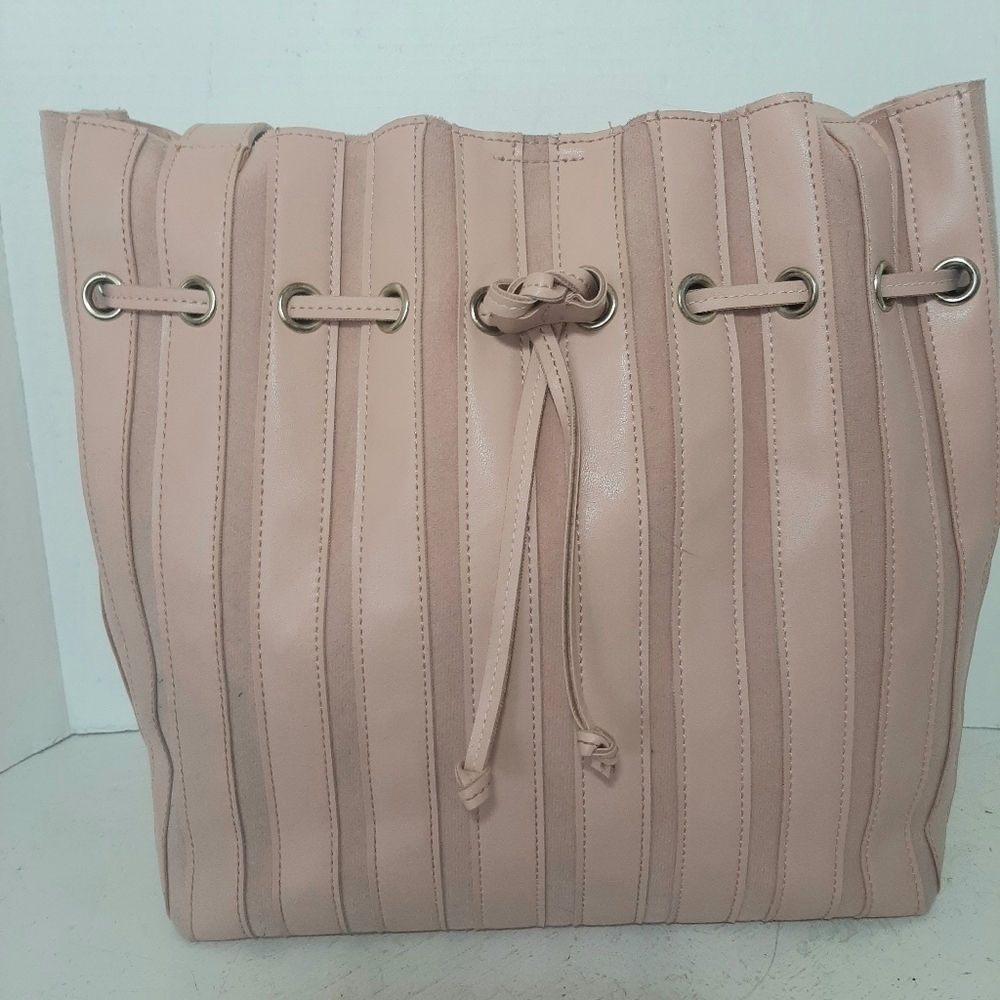 Elegant Pink Drawstring Accent Bucket Bag Faux leather and faux suede.